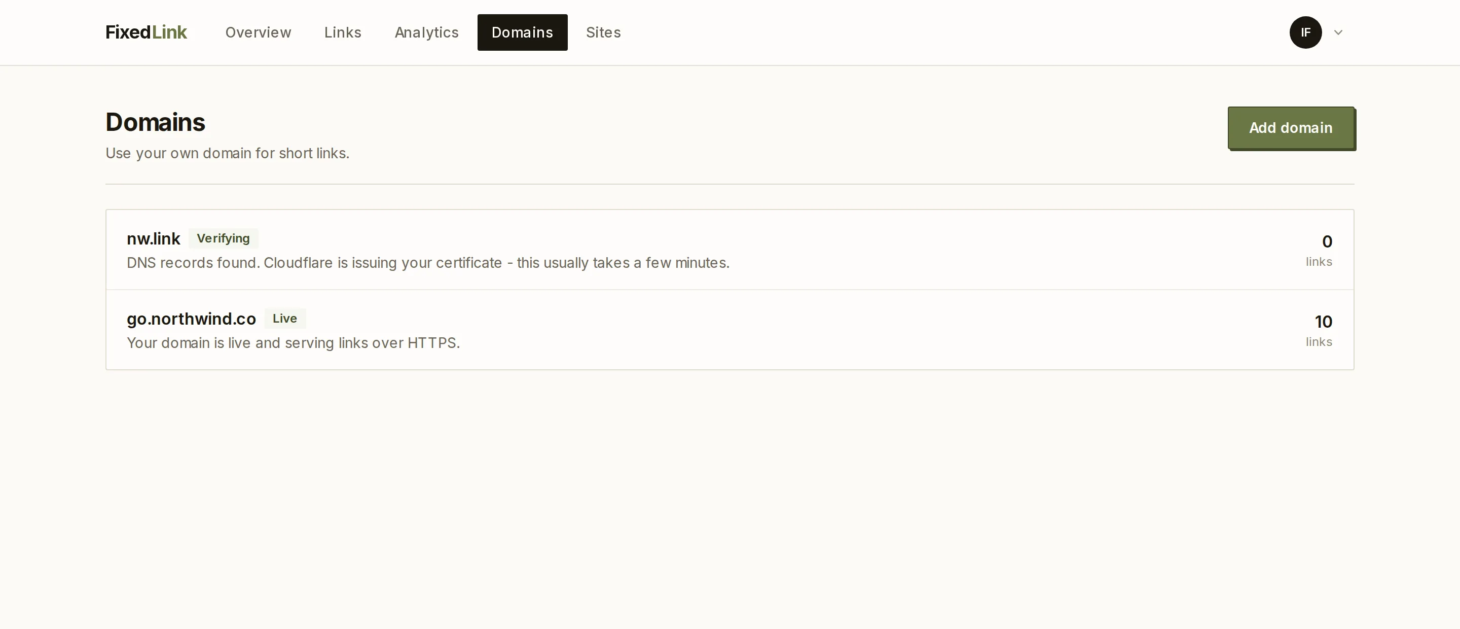 The domains page, with one domain live and another waiting on DNS verification